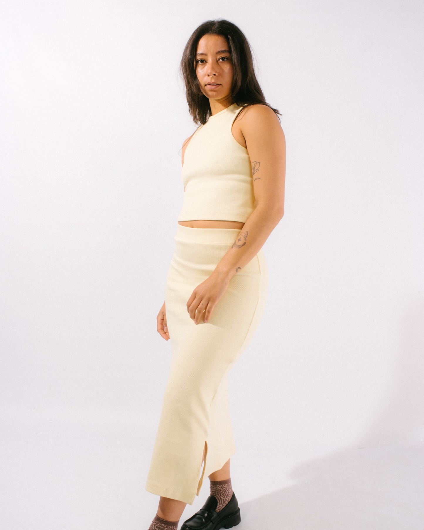 ribbed midi skirt in butter yellow on model