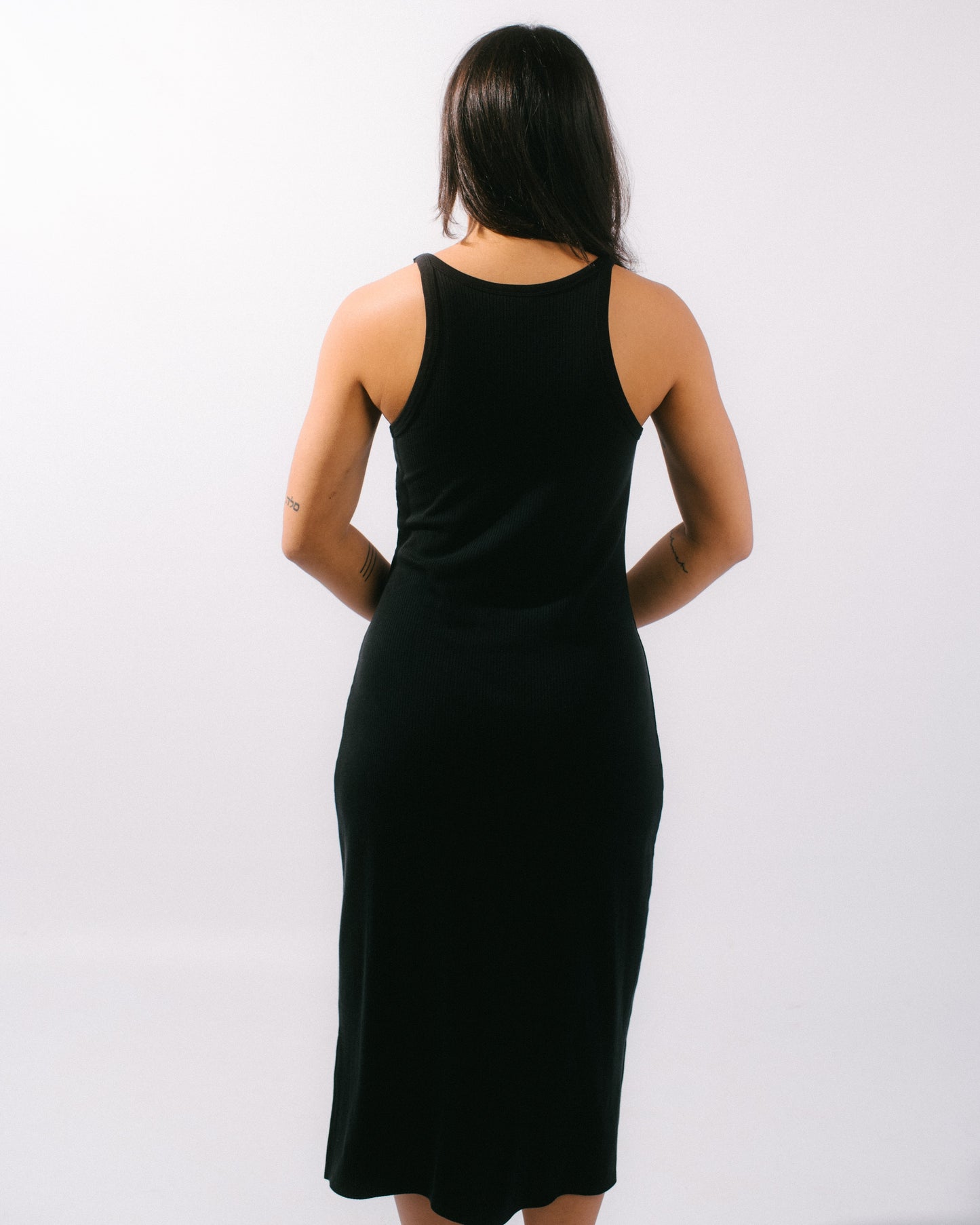 vintage ribbed midi dress in black on back of model